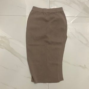 New with tags size large tight fit skirt with thigh high split